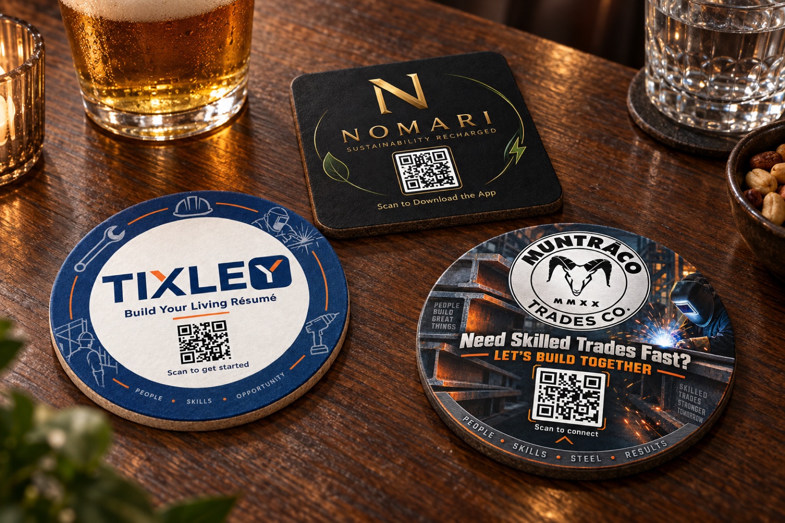 Staged pub-table concept featuring TIXLEY, NOMARI and MUNTRACO advertising coasters